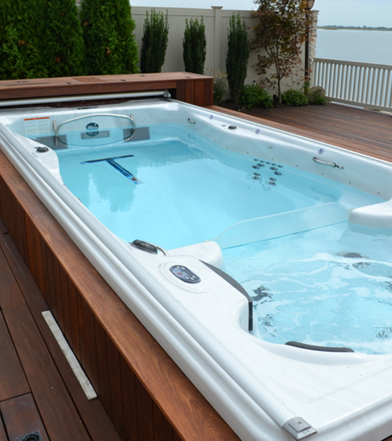 Don't choose between a pool and a hot tub with a dual-temperature swim spa