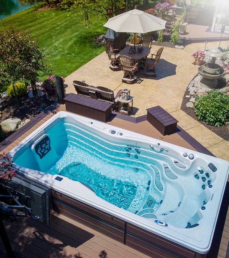 The pool alternative is the star of this small backyard, which is ideal for entertaining