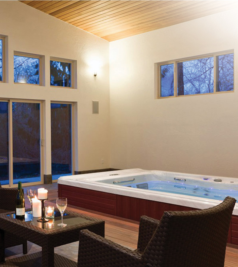 A home addition is the perfect opportunity to install an in-ground swim spa