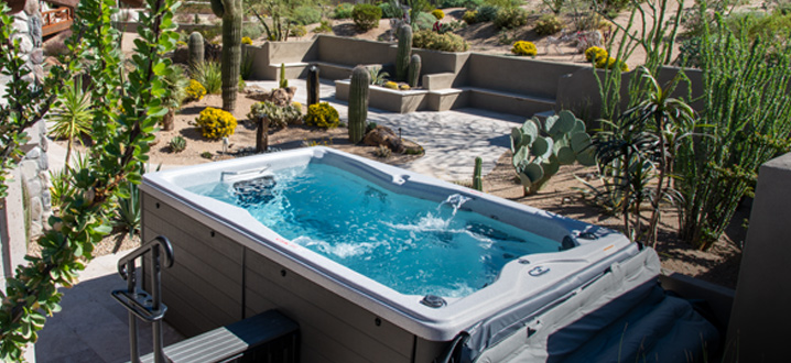 Backyard install of a swim spa in a desert climate