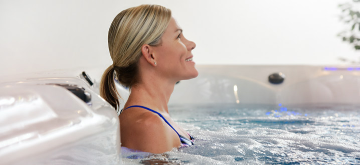 Mirinda Carfrae in an H2X Swim Spa by Master Spas