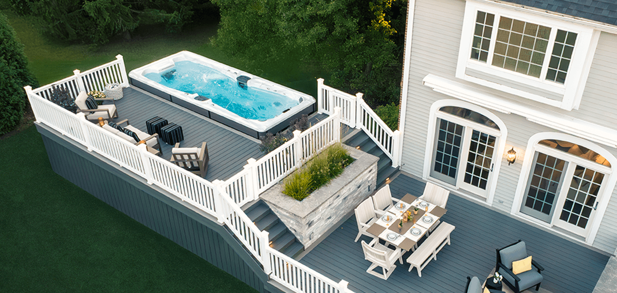 H2X Fitness Swim Spa surrounded by a deck.