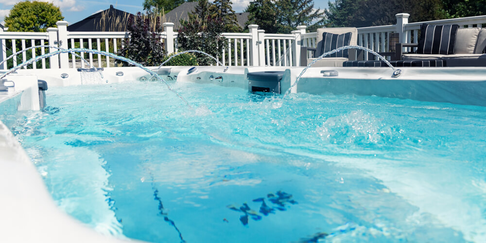 Crystal clear swim spa water with laminar flow water features on.